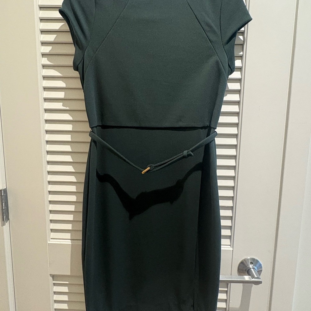 Emerald green suiting dress